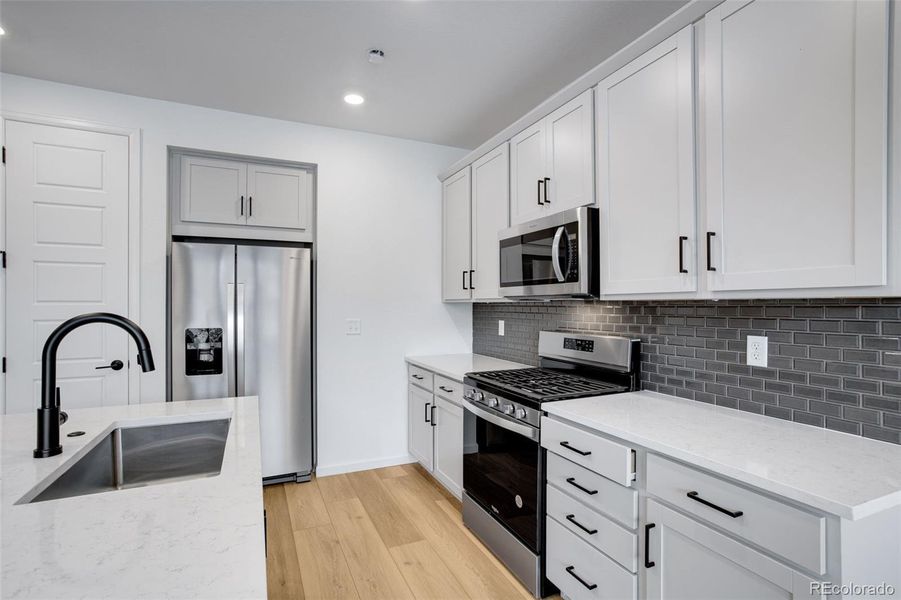 Furnished interior view inside a new home in Westside Crossing Townhomes, Berthoud (Image 15).
