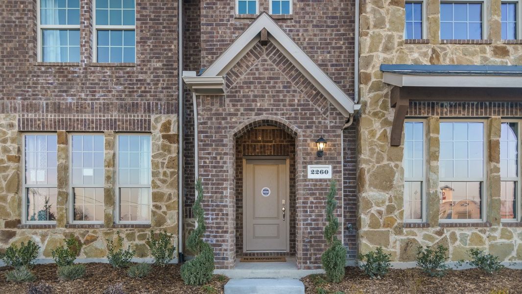 Exterior details and patio area of a home in Liberty Crossing, Royse City (Image 3).