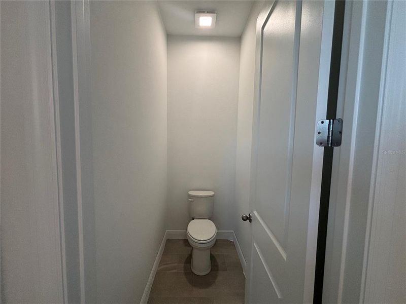 Furnished interior view inside a new home in Ardisia Park Estate, New Smyrna Beach (Image 15).