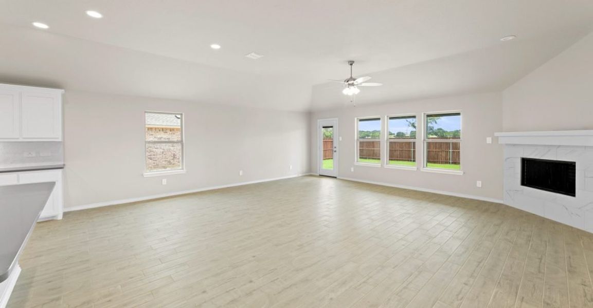 Representative exterior photo of a completed home built from the Lincoln by Impression Homes in Keeneland, Aubrey, TX (Image 8). Representative exterior photo of a completed home built from the Lincoln by Impression Homes in Keeneland, Aubrey, TX (Image 8).