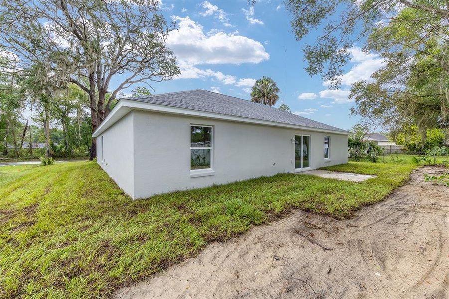 Exterior details and patio area of a home in , Ocala (Image 36).