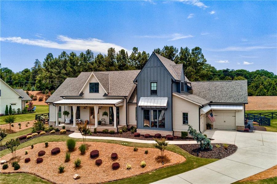 Front exterior of a new home in , Canton, GA, highlighting curb appeal (Image 21). Front exterior of a new home in , Canton, GA, highlighting curb appeal (Image 21).