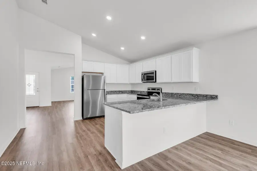 Furnished interior view inside a new home in Rolling Hills, Green Cove Springs (Image 5). Furnished interior view inside a new home in Rolling Hills, Green Cove Springs (Image 5).