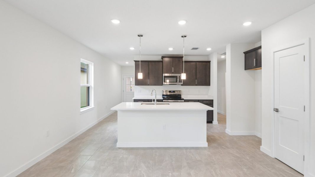 Furnished interior view inside a new home in Grasslands West, Lakeland (Image 14).