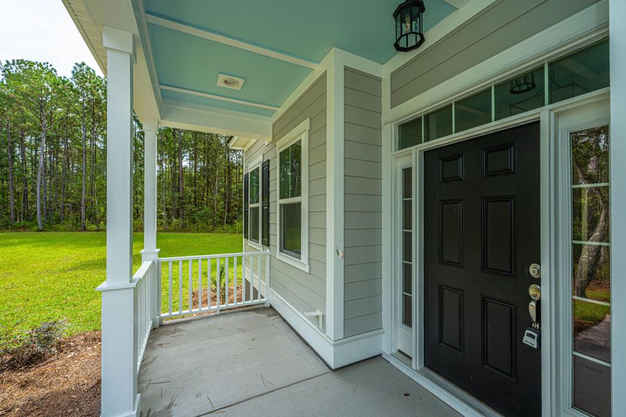 Exterior details and patio area of a home in , Awendaw (Image 2).