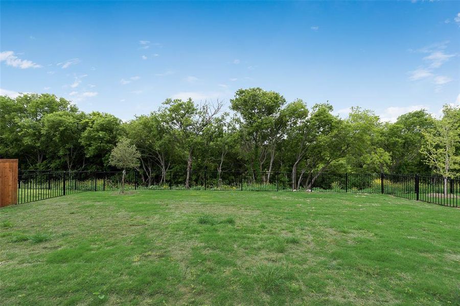 Front exterior of a new home in Valencia On The Lake, Little Elm, TX, highlighting curb appeal (Image 2). Front exterior of a new home in Valencia On The Lake, Little Elm, TX, highlighting curb appeal (Image 2).