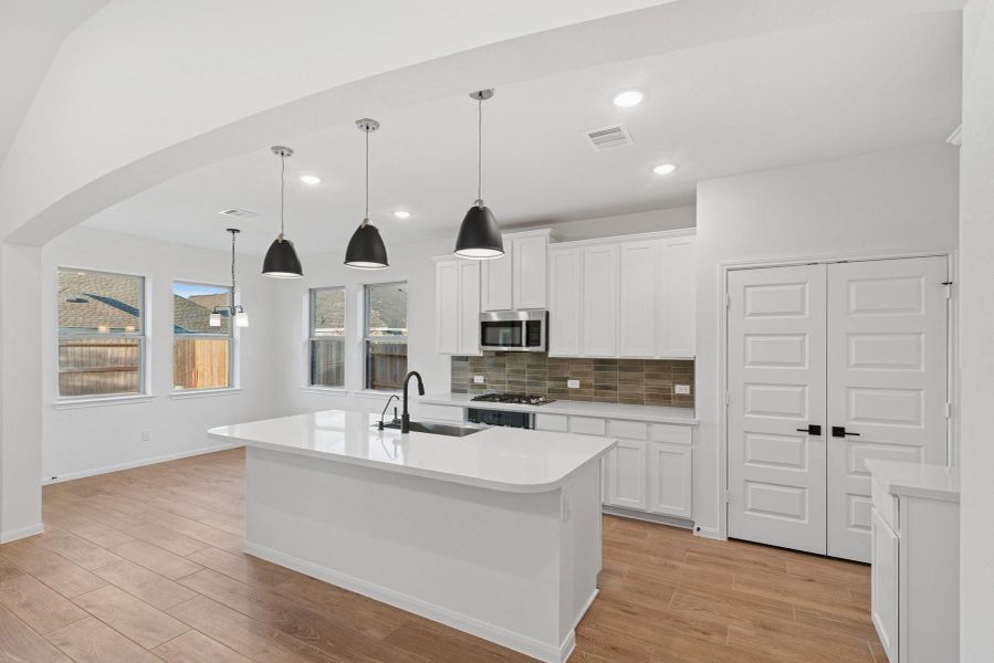 Gourmet island kitchen (*Photo not of actual home and used for illustration purposes only.)