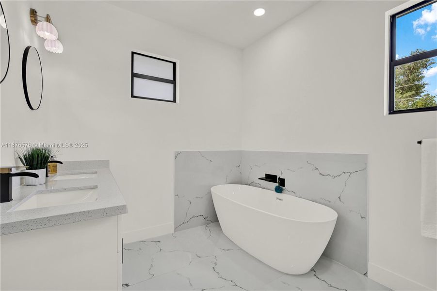 Master bathroom has tub and shower separetely