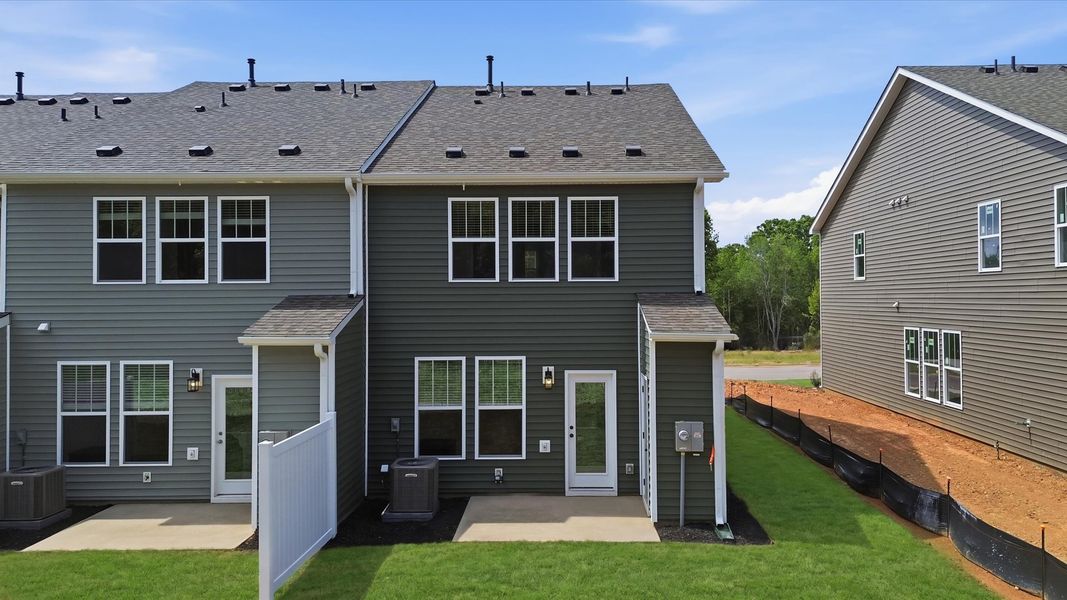 Refined rear exterior with a private backyard for dining, relaxing, or entertaining at the Marion Square community Refined rear exterior with a private backyard for dining, relaxing, or entertaining at the Marion Square community