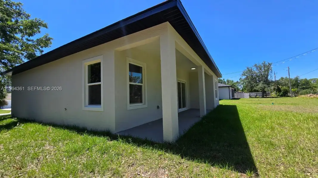 Exterior details and patio area of a home in , Palm Bay (Image 3).