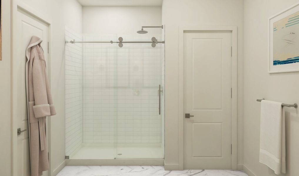 Primary bath with chrome fixtures and glass shower enclosure