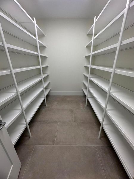 Furnished interior view inside a new home in Coral Isles at Avenir, Palm Beach Gardens (Image 4).