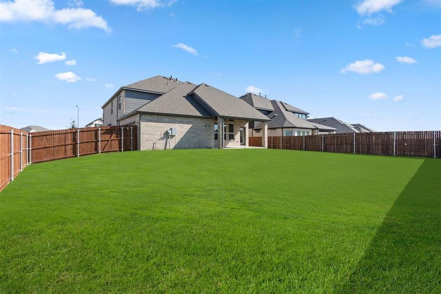 Front exterior of a new home in Marine Creek Ranch, Fort Worth, TX, highlighting curb appeal (Image 1).