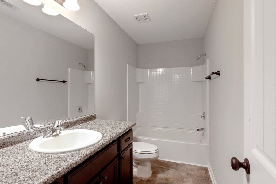 Representative furnished interior of a home built from the The Arcadia by RTS Homes in Doctor's Creek, Ludowici (Image 13).