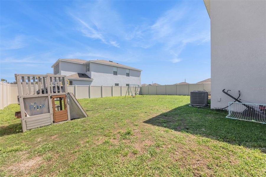 Exterior details and patio area of a home in Harvest Ridge, Zephyrhills (Image 30).