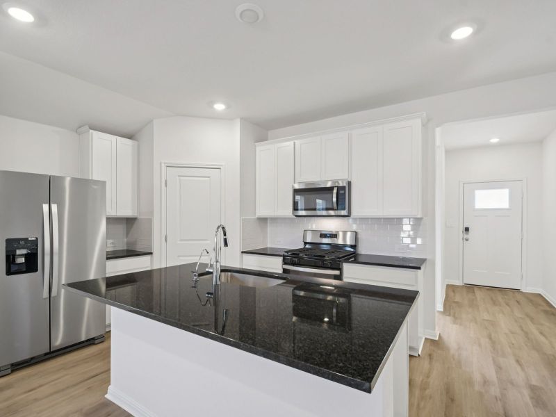 Furnished interior view inside a new home in Flora, Hutto (Image 5).