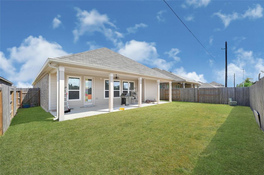 Exterior details and patio area of a home in Lakewood Pines Preserve, Houston (Image 21). Exterior details and patio area of a home in Lakewood Pines Preserve, Houston (Image 21).