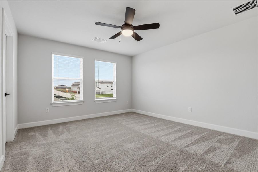 Spacious, unfurnished interior of a new home in Whisper Valley, Manor (Image 23).