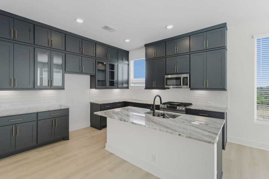 Representative furnished interior of a home built from the Athena by Chesmar Homes in Prominence Urban, San Antonio (Image 4).