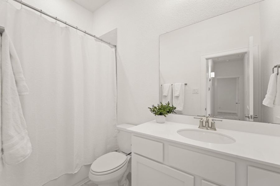 Furnished interior view inside a new home in The Highlands - 65', Porter (Image 11).