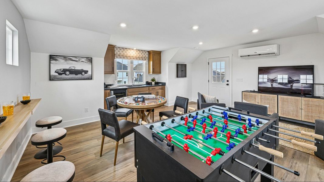 The Westport Plan by DRB Homes in Miller Farm - Detached garage upstairs game room with kitchenette. The Westport Plan by DRB Homes in Miller Farm - Detached garage upstairs game room with kitchenette.