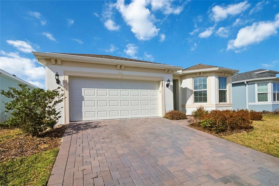 Front exterior of a new home in , St. Cloud, FL, highlighting curb appeal (Image 26).