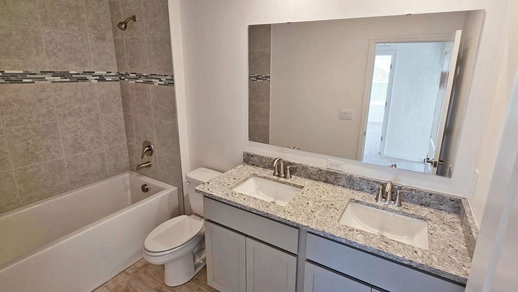 Furnished interior view inside a new home in Island Forest Preserve, Merritt Island (Image 5).