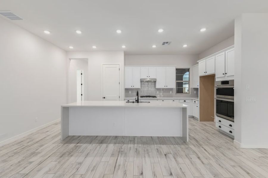 Furnished interior view inside a new home in Valencia at Granite Vista, Waddell (Image 4).