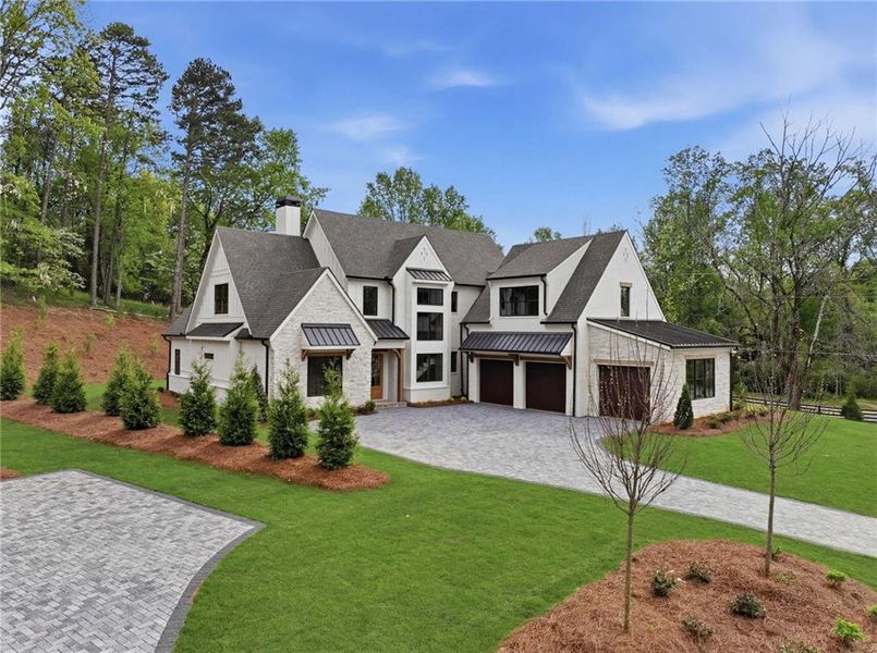 Front exterior of a new home in , Cumming, GA, highlighting curb appeal (Image 19).