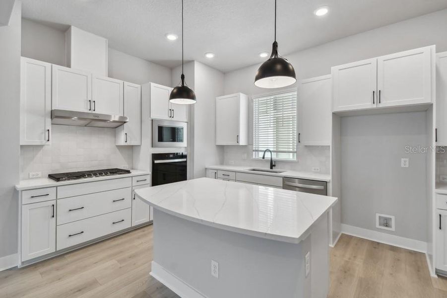 Furnished interior view inside a new home in Towns at Union, St. Petersburg (Image 5).
