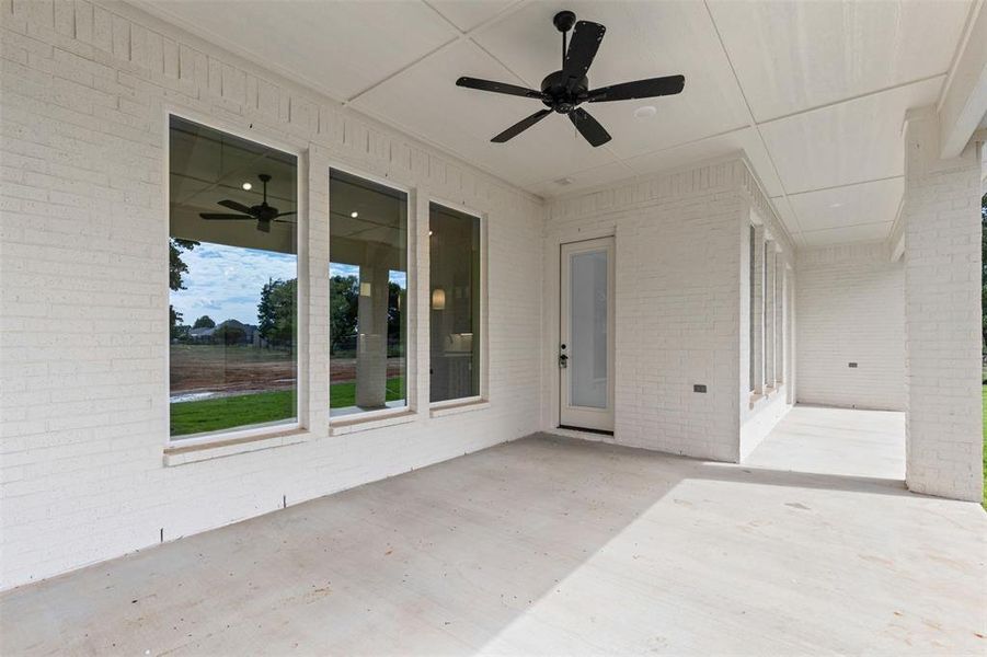 View of patio / terrace with ceiling fan