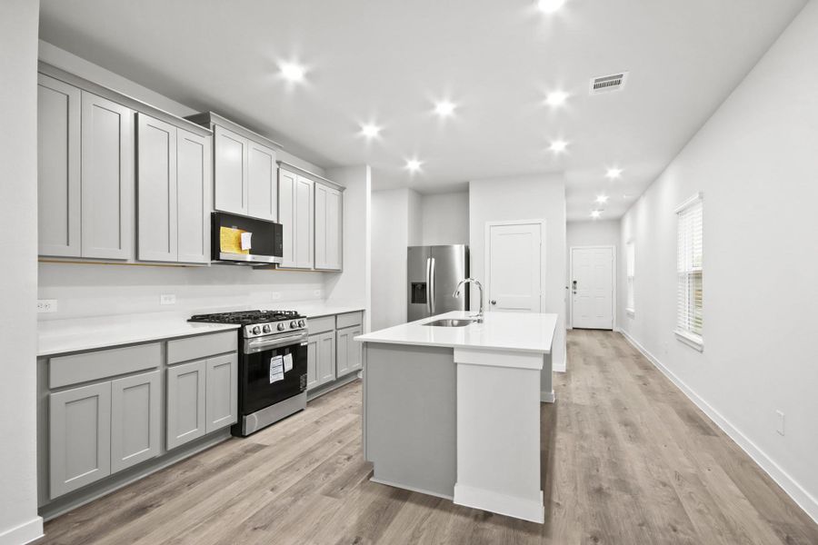 Furnished interior view inside a new home in Lexington Heights, Willis (Image 7).