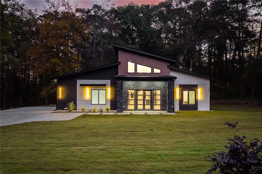 Front exterior of a new home in , Winder, GA, highlighting curb appeal (Image 37). Front exterior of a new home in , Winder, GA, highlighting curb appeal (Image 37).