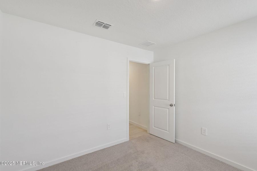 Spacious, unfurnished interior of a new home in Cypress Meadows - Signature Series, Jacksonville (Image 27).