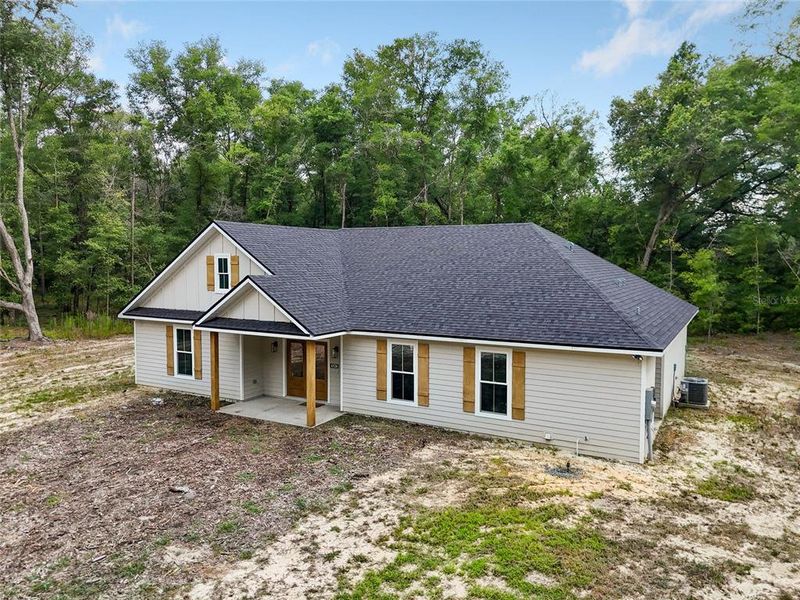 Exterior details and patio area of a home in , Alachua (Image 4).