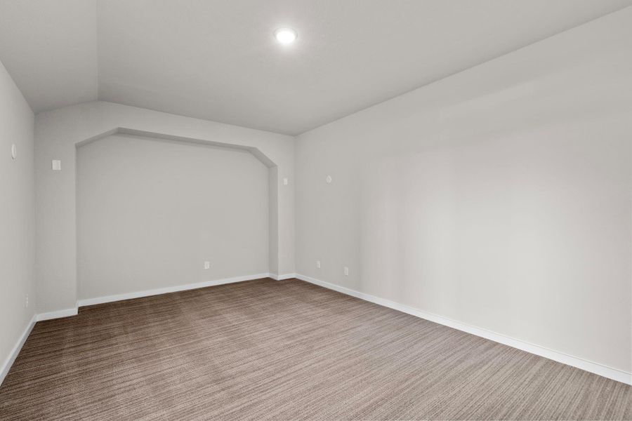 Large media room off the game room, perfect for movie night or gaming