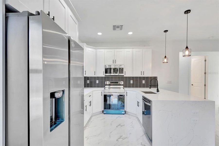 Furnished interior view inside a new home in , Port Charlotte (Image 7). Furnished interior view inside a new home in , Port Charlotte (Image 7).