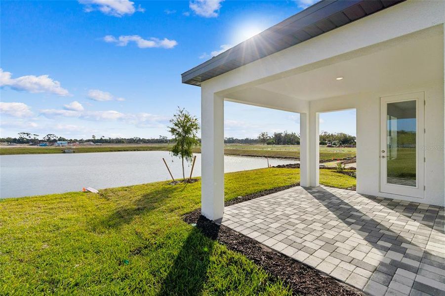Exterior details and patio area of a home in Southpointe, Palmetto (Image 16).