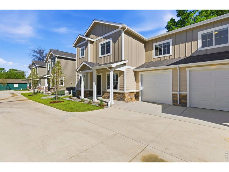 Front exterior of a new home in , Loveland, CO, highlighting curb appeal (Image 28).