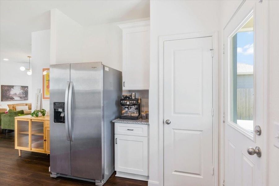 Kitchen features granite countertops , beautiful white cabinets with updates hardware, stainless appliances, large sink and natural light. Kitchen features granite countertops , beautiful white cabinets with updates hardware, stainless appliances, large sink and natural light.