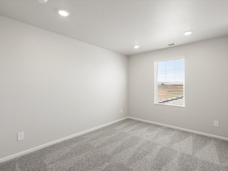 Spacious, unfurnished interior of a new home in Buffalo Highlands: The Flora Collection, Commerce City (Image 13).