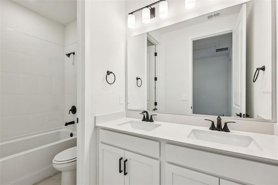 Furnished interior view inside a new home in Ridgehaven - Signature Series, Ormond Beach (Image 11).