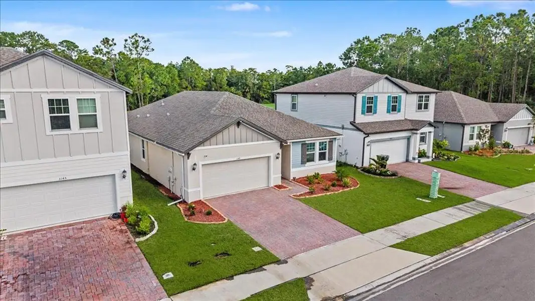 Front exterior of a new home in , Daytona Beach, FL, highlighting curb appeal (Image 2). Front exterior of a new home in , Daytona Beach, FL, highlighting curb appeal (Image 2).