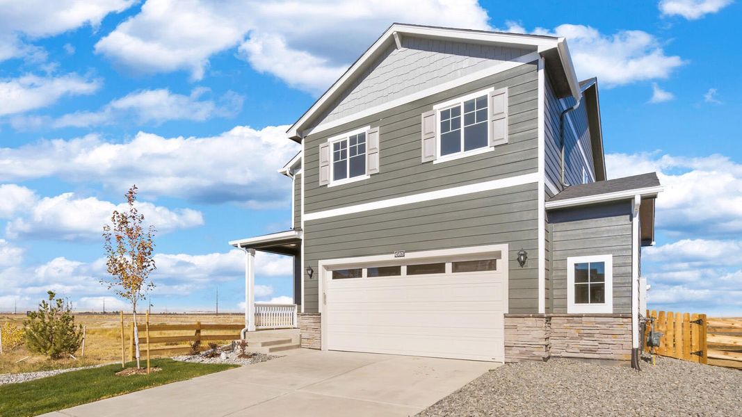 Front exterior of a new home in The Ridge at Lorson Ranch, Colorado Springs, CO, highlighting curb appeal (Image 13).