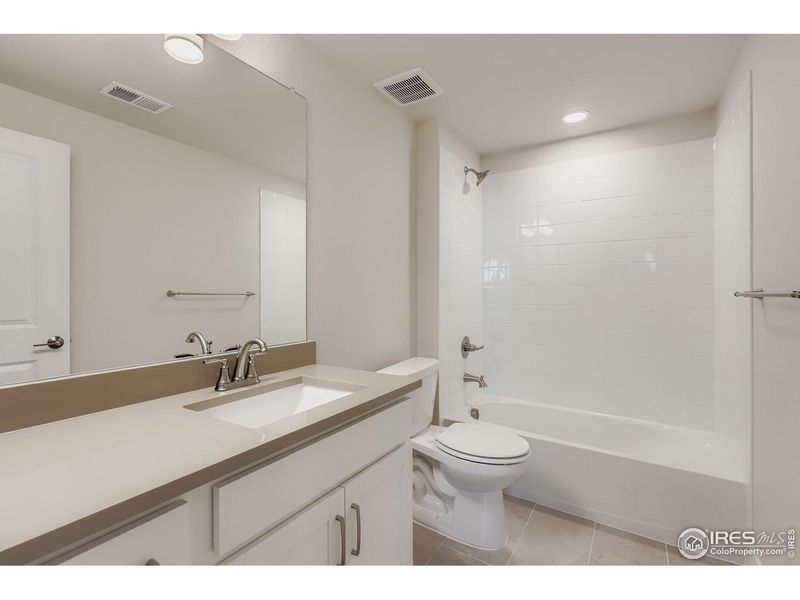 Furnished interior view inside a new home in Barefoot Lakes, Firestone (Image 11). Furnished interior view inside a new home in Barefoot Lakes, Firestone (Image 11).