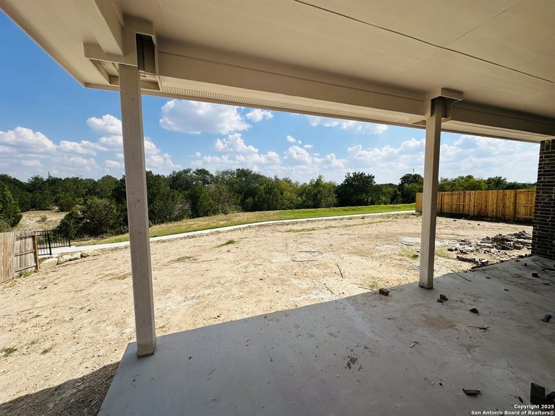 Exterior details and patio area of a home in Village at Three Oaks, Seguin (Image 3). Exterior details and patio area of a home in Village at Three Oaks, Seguin (Image 3).