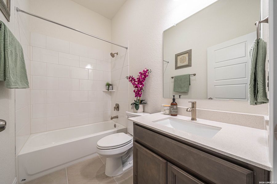 Furnished interior view inside a new home in Ladera - Laurel Hollow 60', San Antonio (Image 12).