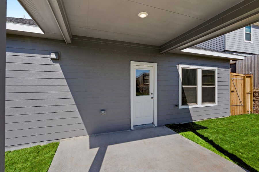 Exterior details and patio area of a home in Westridge Cove, Panorama Village (Image 3).