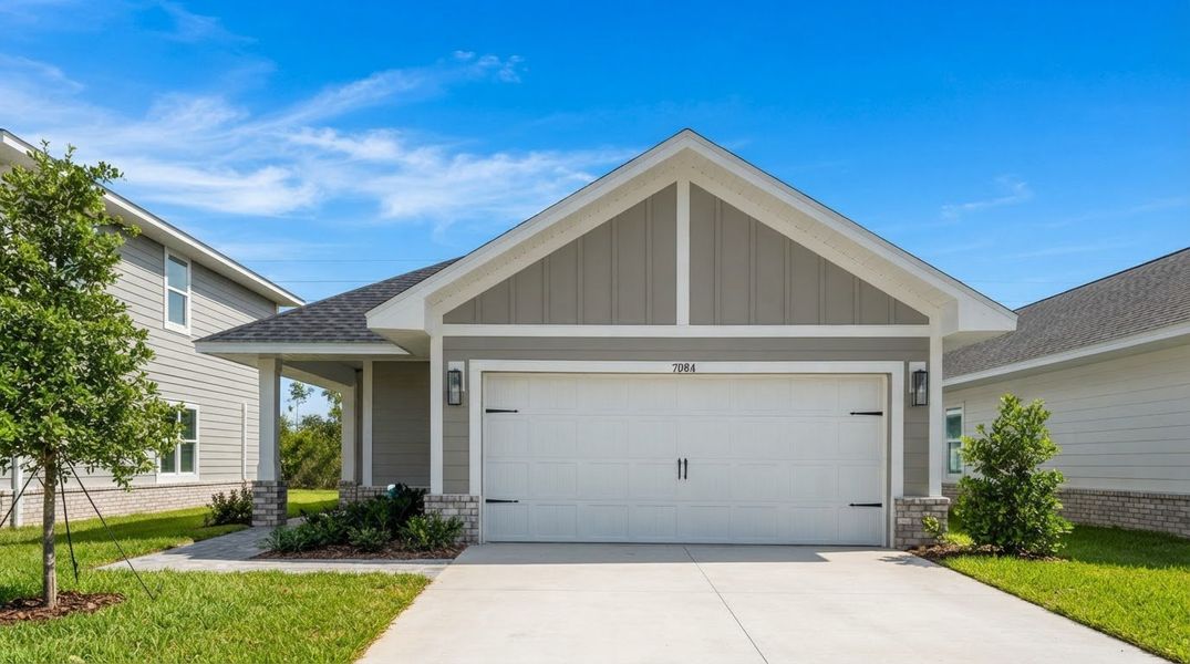 Front exterior of a new home in Parkbrook, Panama City, FL, highlighting curb appeal (Image 1). Front exterior of a new home in Parkbrook, Panama City, FL, highlighting curb appeal (Image 1).