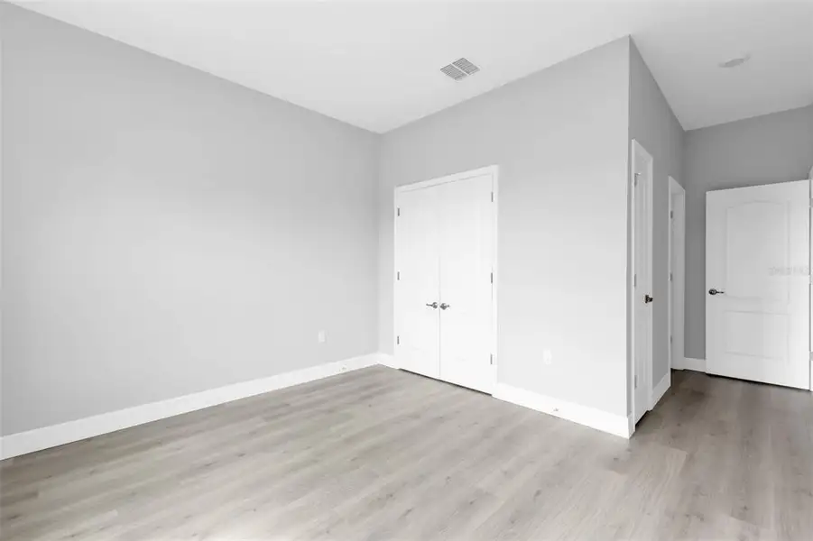 Spacious, unfurnished interior of a new home in , Port Charlotte (Image 20).